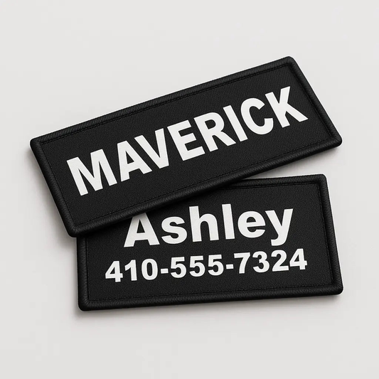 Two black patches with white text on a light gray background